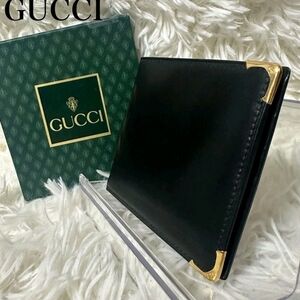 Gucci Black Leather Wallet with Gold Accents